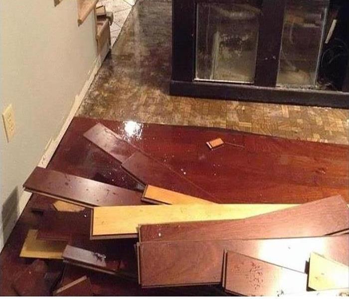 Hardwood floors affected by water damage