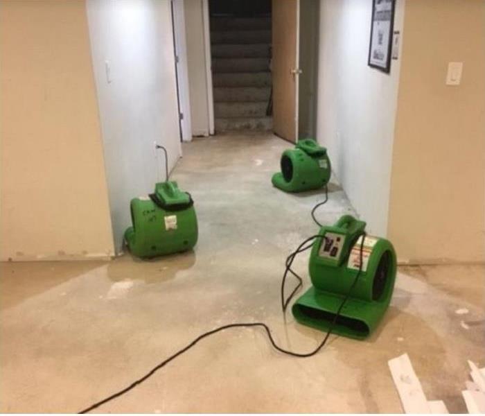 SERVPRO drying equipment being used on water damaged floor